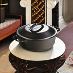 Lodge Cast Iron Dutch Oven - Loop Handle Cooking Vessel - Even Heat Retention - Oven-Safe, Versatile Pot - 2 Quart