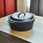 Lodge Cast Iron Dutch Oven - Loop Handle Cooking Vessel - Even Heat Retention - Oven-Safe, Versatile Pot - 7 Quart