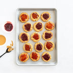 Nordic Ware Brilliant™ Colorful 3-Pc Baking Set, Nonstick made without PFAS or PTFE for safe cooking; Reinforced steel rim prevents warping; Includes Half Sheet, Quarter Sheet, and Eighth Sheet