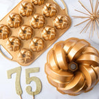 Nordic Ware NW 95577 75th Anniversary Braided Rope Bundt Cake Pan, Gold 12 Cup Capacity