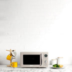 Haden 700 Watt 0.7 Cubic Foot Microwave Oven with Digital Controls, Defrost, and Instant Start Countertop Small Appliance, Putty/Chrome