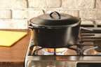 Lodge Cast Iron Dutch Oven - Loop Handle Cooking Vessel - Even Heat Retention - Oven-Safe, Versatile Pot - 7 Quart
