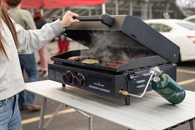 Gridiron Gameday 24" Portable Propane Grill – Flat Top Tabletop Griddle with Hinged Lid, 24,000 BTUs, Flamethrower Ignition, Dual Heat Zones, Adjustable Legs for Tailgating, Camping & Outdoor Cooking