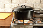 Lodge Cast Iron Dutch Oven - Loop Handle Cooking Vessel - Even Heat Retention - Oven-Safe, Versatile Pot - Handle Holders Included - 5 Quart